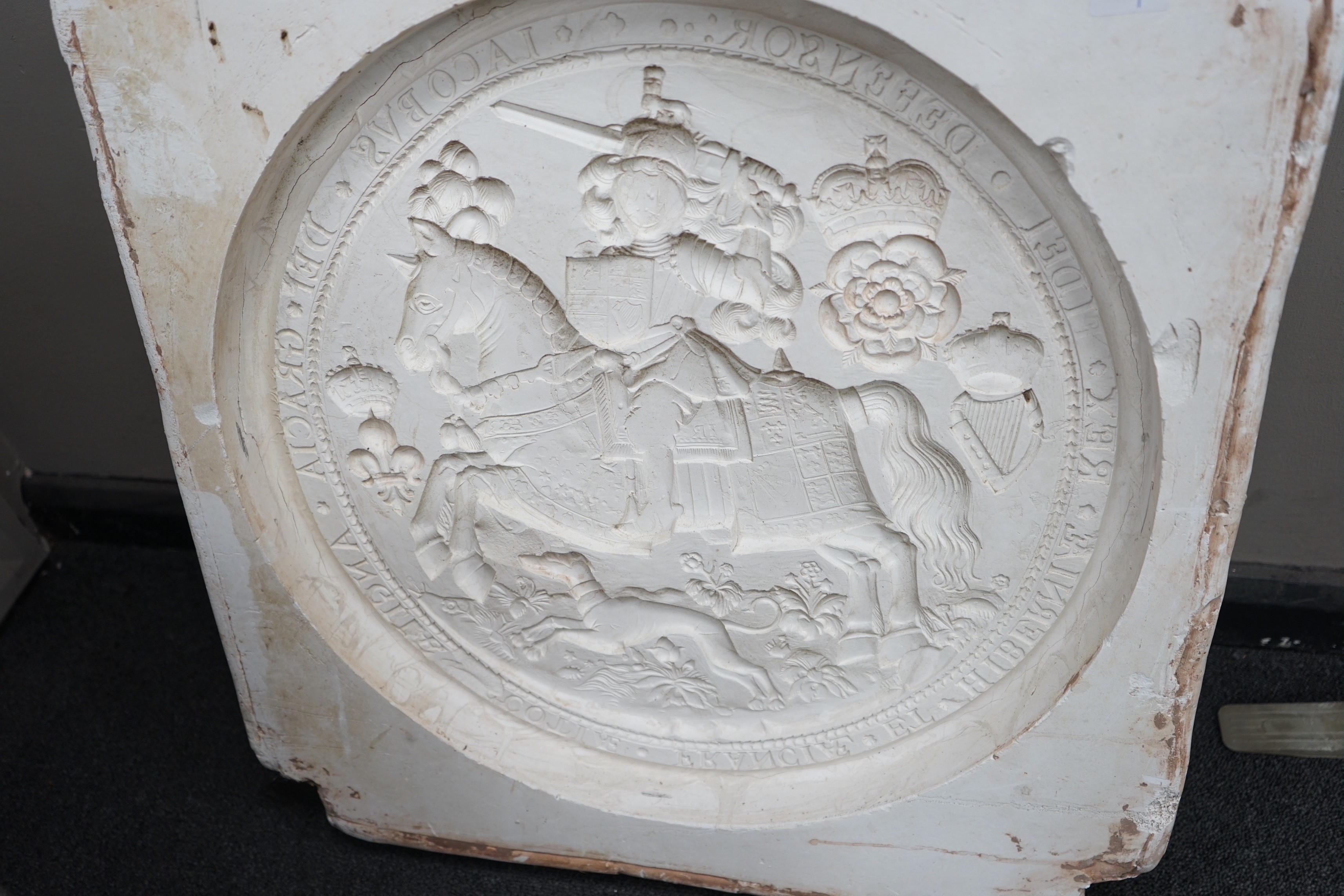 An intaglio moulded plaster model of James I Grand seal, height 63cms